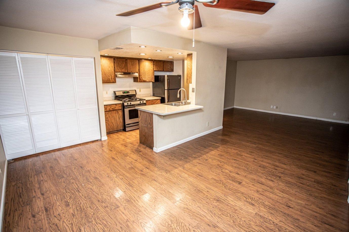 839 Springer Drive Redding, CA 96003 - Photo 3 of 10 a kitchen with granite countertop a stove and a sink