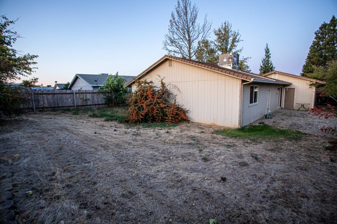 839 Springer Drive Redding, CA 96003 - Photo 9 of 10 a view of a backyard