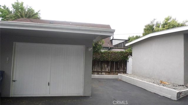 a view of a house with a garage