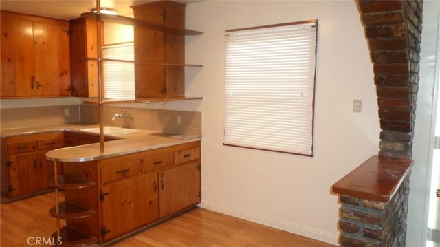 a bathroom with a sink and a window