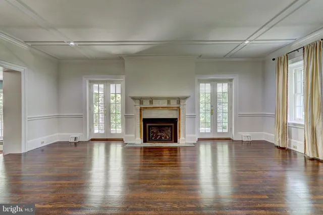 a view of a house with wooden floor and outdoor space