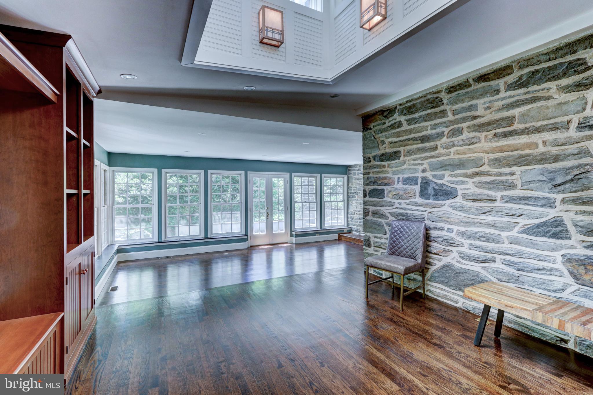 217 Glenn Road Ardmore, PA 19003 - Photo 20 of 65 a view of a livingroom with lounge chair and a large window