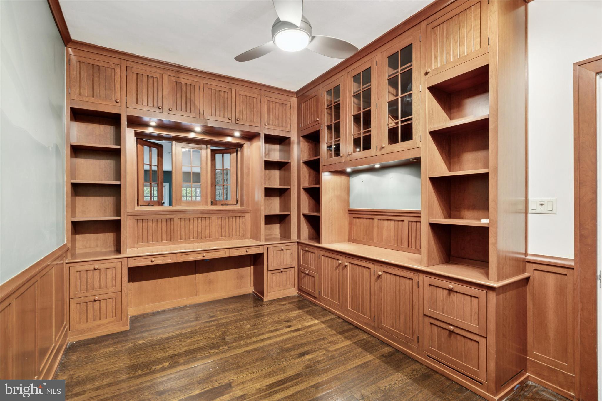217 Glenn Road Ardmore, PA 19003 - Photo 30 of 65 Elegant wood-paneled study with built-in shelves