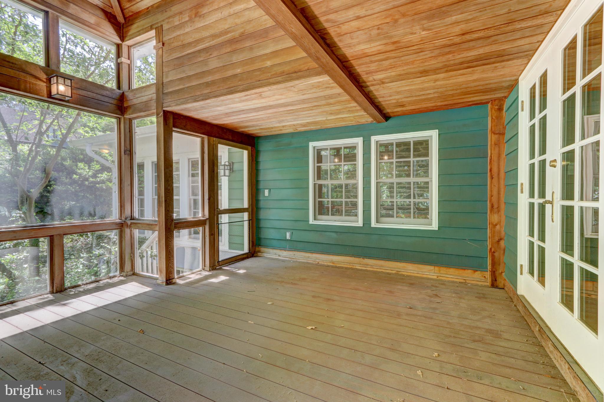 217 Glenn Road Ardmore, PA 19003 - Photo 35 of 65 a view of livingroom with wooden floor and floor to ceiling window