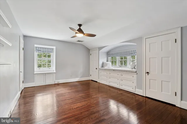 a view of a backyard with a small cabin