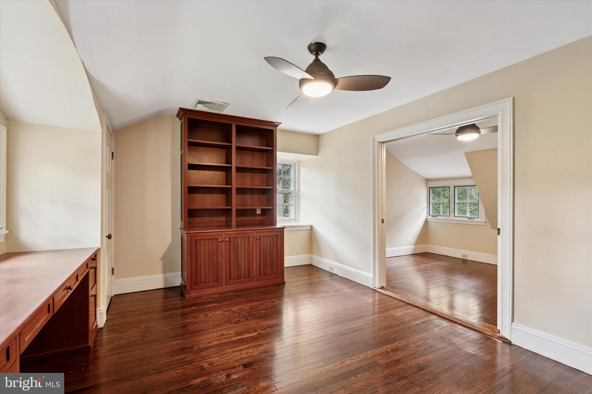 217 Glenn Road Ardmore, PA 19003 - Photo 52 of 65 a view of empty room with wooden floor and fan