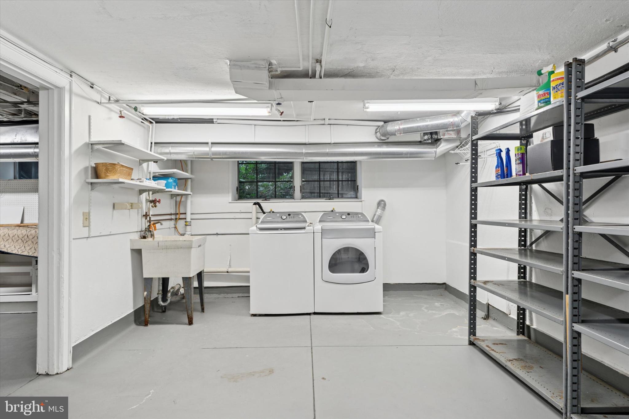 217 Glenn Road Ardmore, PA 19003 - Photo 57 of 65 a utility room with cabinets dryer and washer