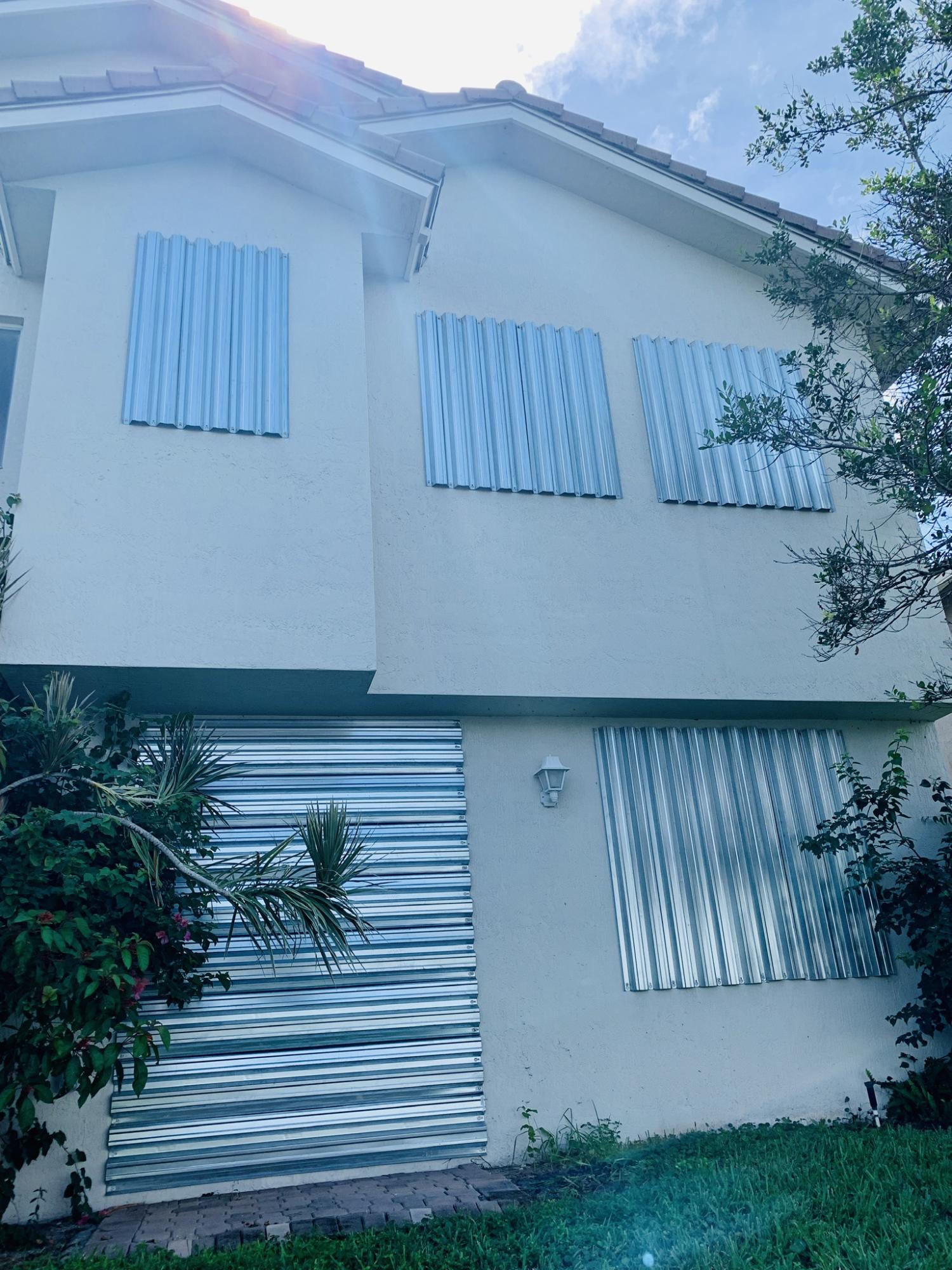 3216 Laurel Ridge Circle Riviera Beach, FL 33404 - Photo 33 of 40 Shutter complete