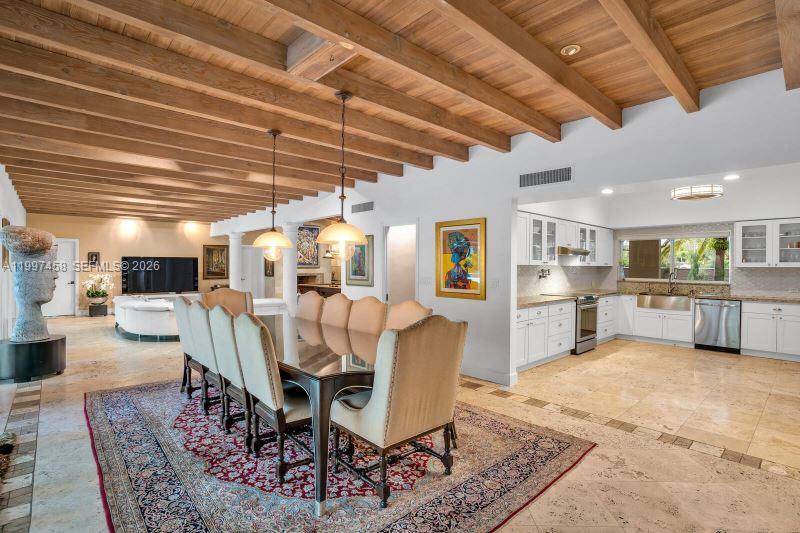 7405 Southwest 79th Court Miami, FL 33143 - Photo 25 of 29 a view of a dining room with furniture