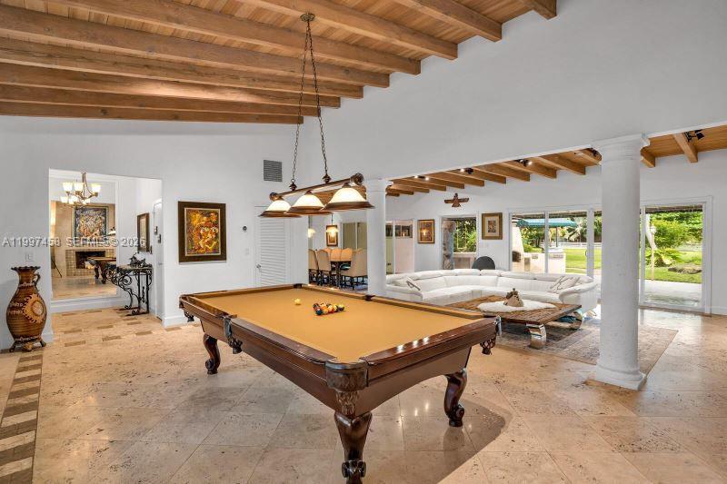 7405 Southwest 79th Court Miami, FL 33143 - Photo 7 of 29 a room with pool table and flat screen tv