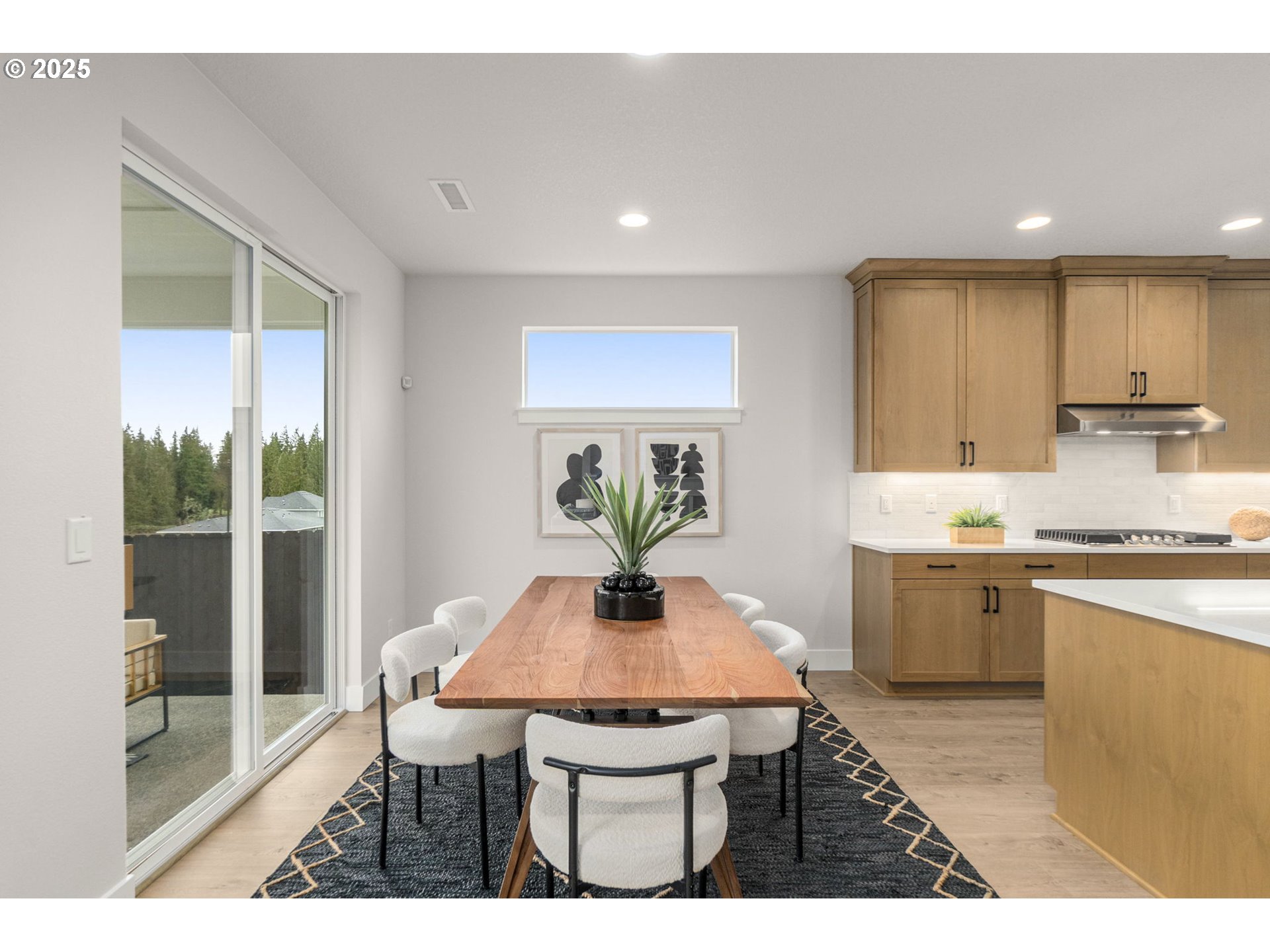 4117 South 14th Way Ridgefield, WA 98642 - Photo 8 of 20 a kitchen with a table and chairs in it