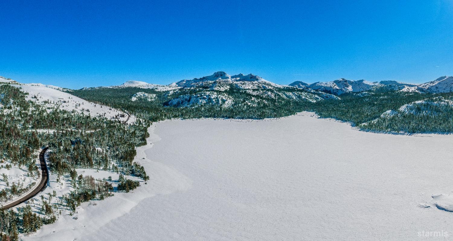 1399 Kirkwood Meadows Drive, Unit R220 Kirkwood, CA 95646 - Photo 14 of 40 a view of a dry yard with mountains in the background