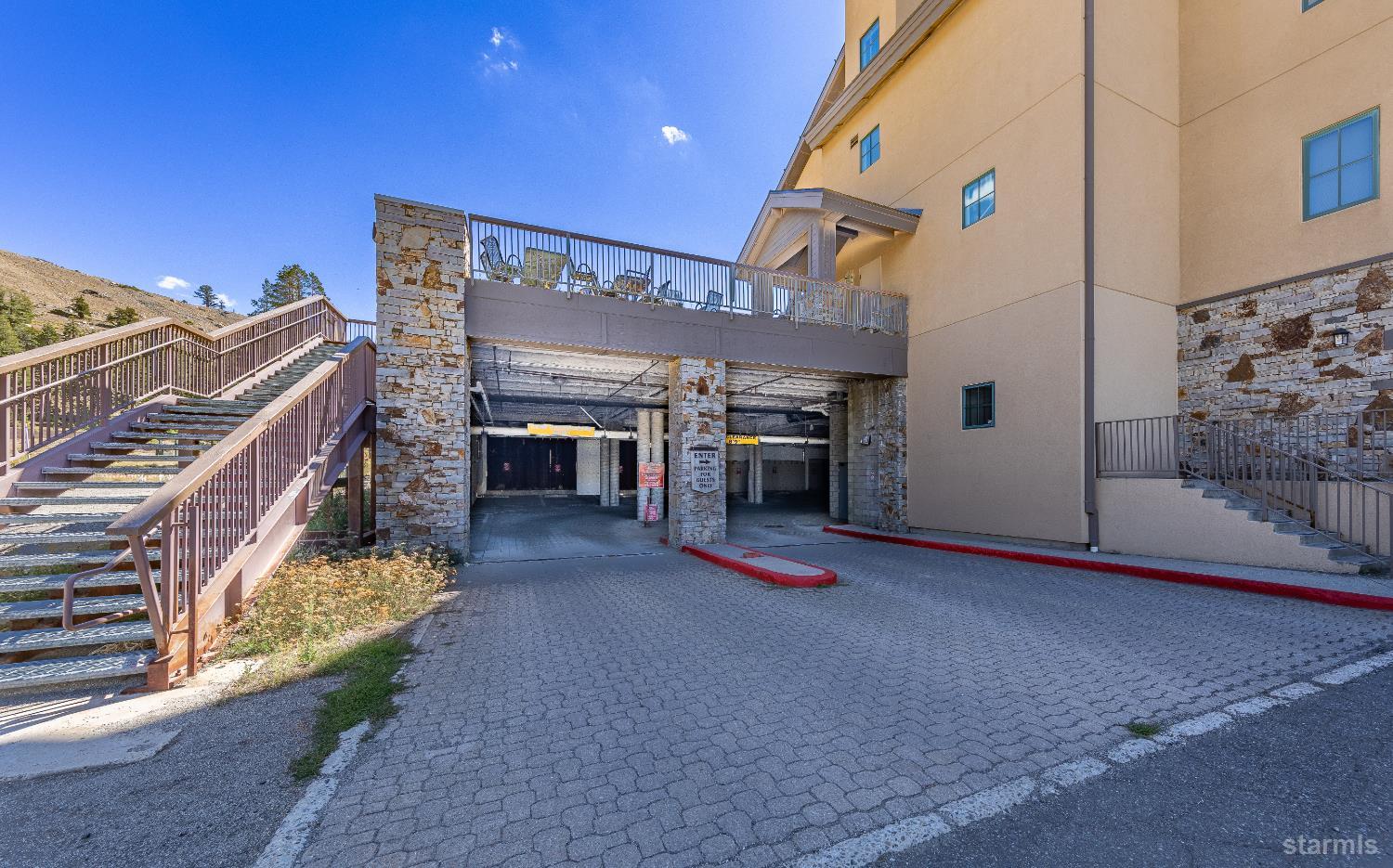 1399 Kirkwood Meadows Drive, Unit R220 Kirkwood, CA 95646 - Photo 15 of 40 a view of a patio with table and chairs