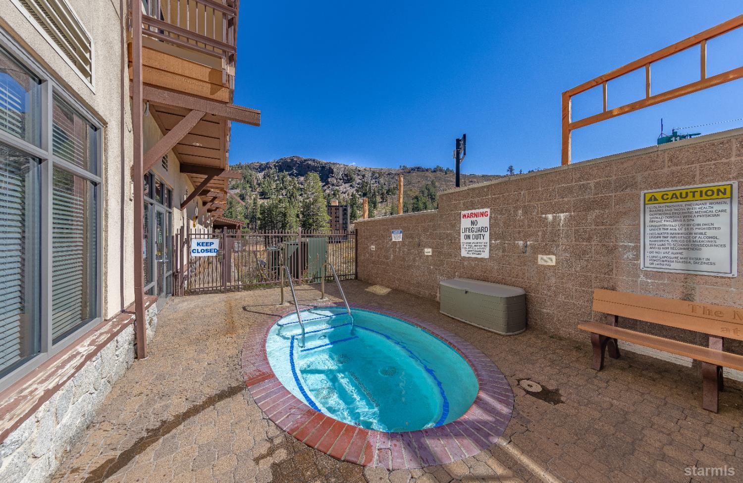 1399 Kirkwood Meadows Drive, Unit R220 Kirkwood, CA 95646 - Photo 16 of 40 a front view of a house with a yard