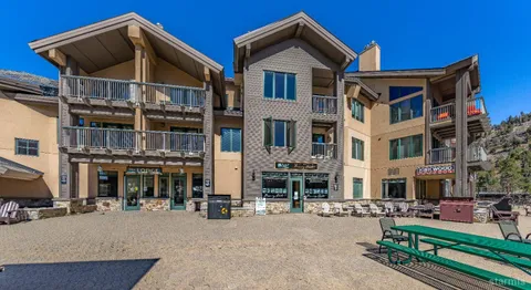 a view of a street with sitting area