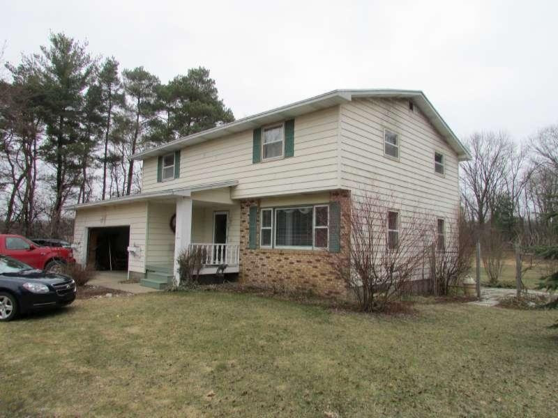 5502 South Carr Road Fruitport, MI 49415 - Photo 2 of 21 Front of home
