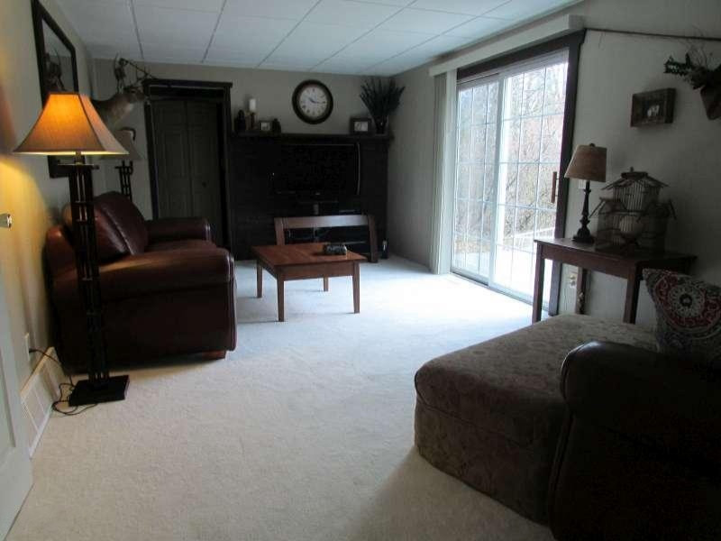 5502 South Carr Road Fruitport, MI 49415 - Photo 6 of 21 Living Room w/Sliders to desk