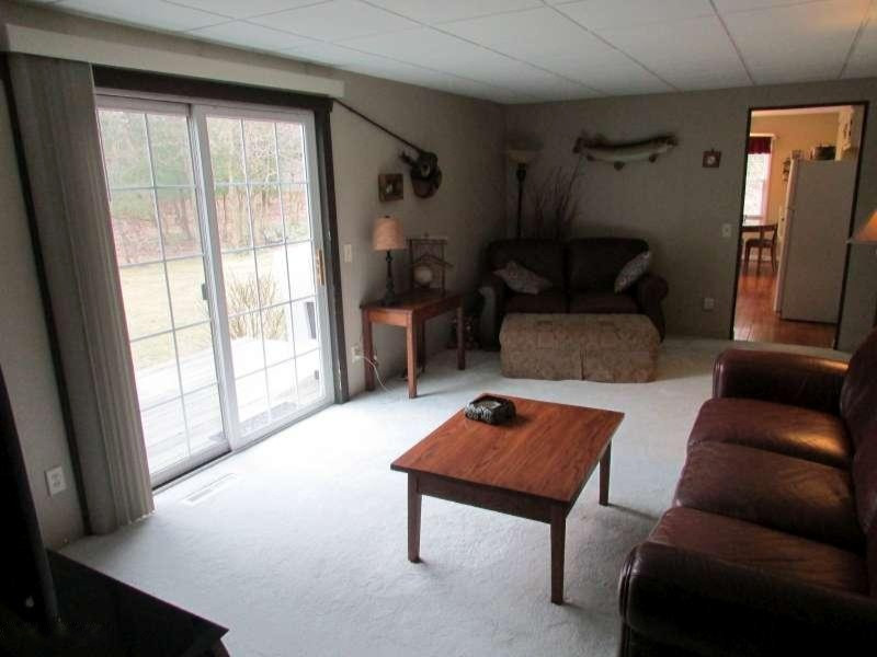 5502 South Carr Road Fruitport, MI 49415 - Photo 7 of 21 Living Room w/sliders to deck