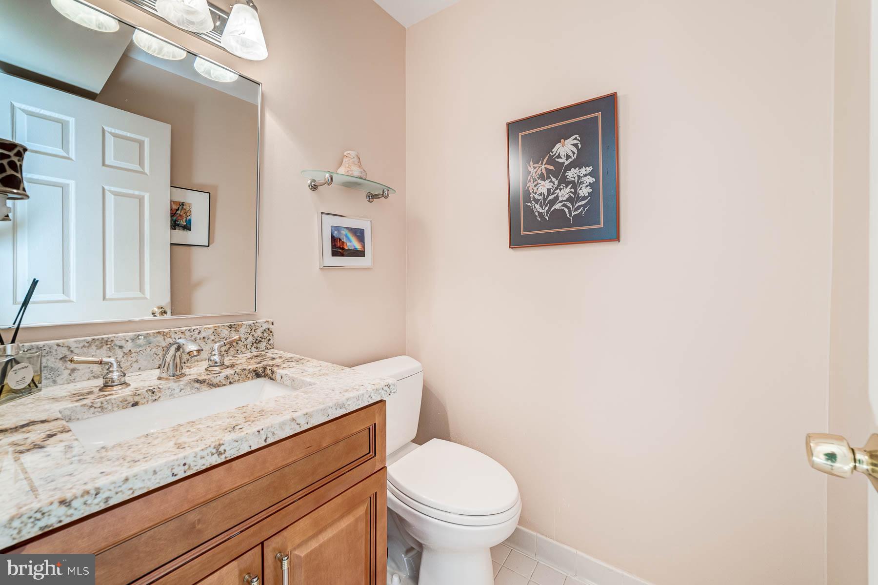 6724 Passageway Place Burke, VA 22015 - Photo 34 of 77 First floor half bath