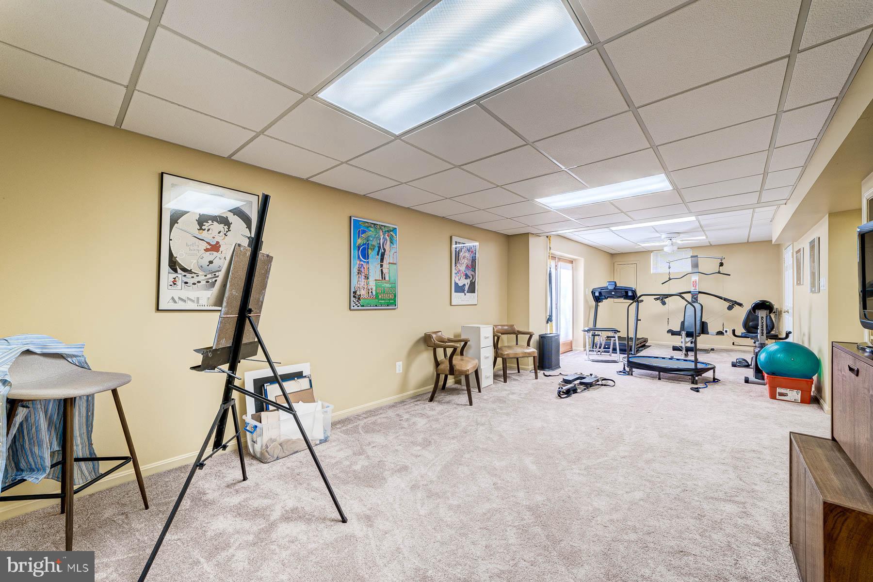 6724 Passageway Place Burke, VA 22015 - Photo 53 of 77 Large bright family room with access to the yard