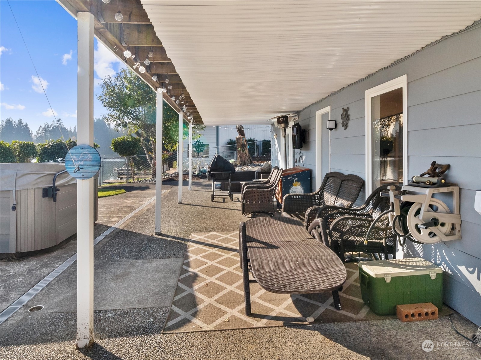 1304 153rd Street South Spanaway, WA 98387 - Photo 27 of 39 a view of a patio with couches and chairs