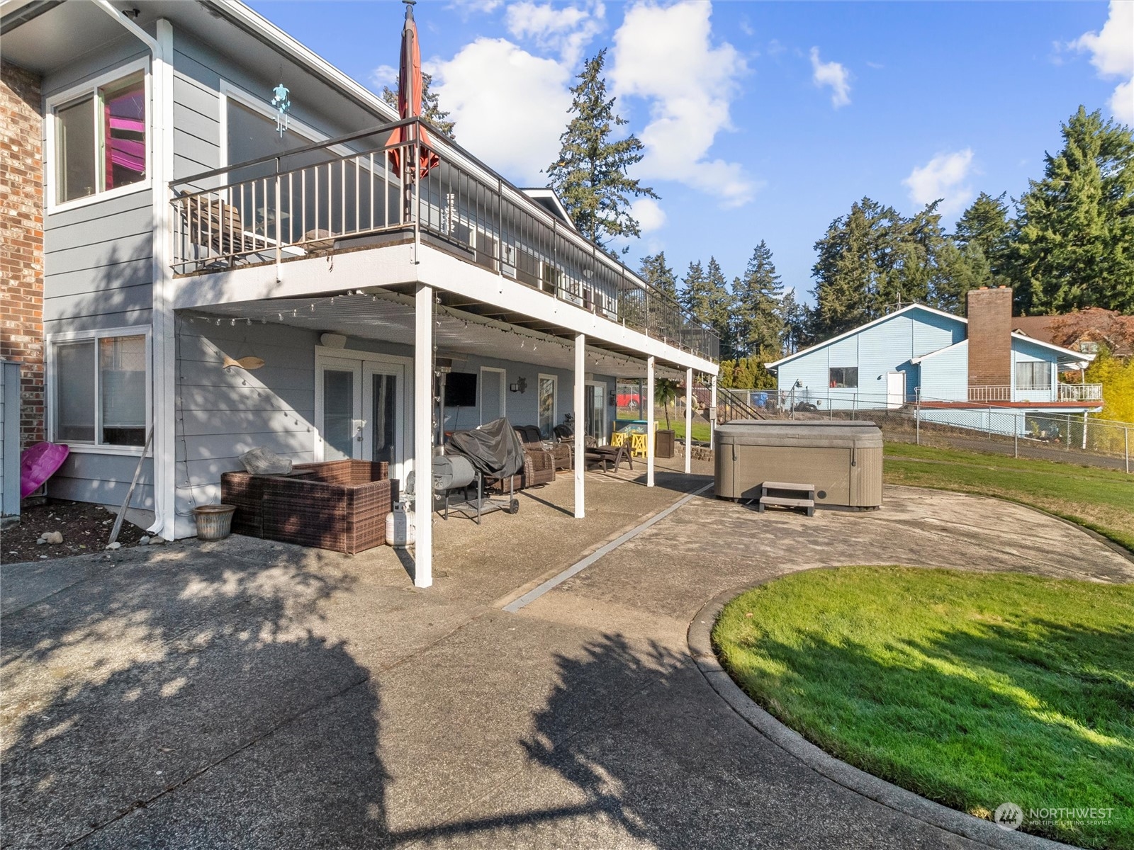 1304 153rd Street South Spanaway, WA 98387 - Photo 28 of 39 a view of a house with a patio
