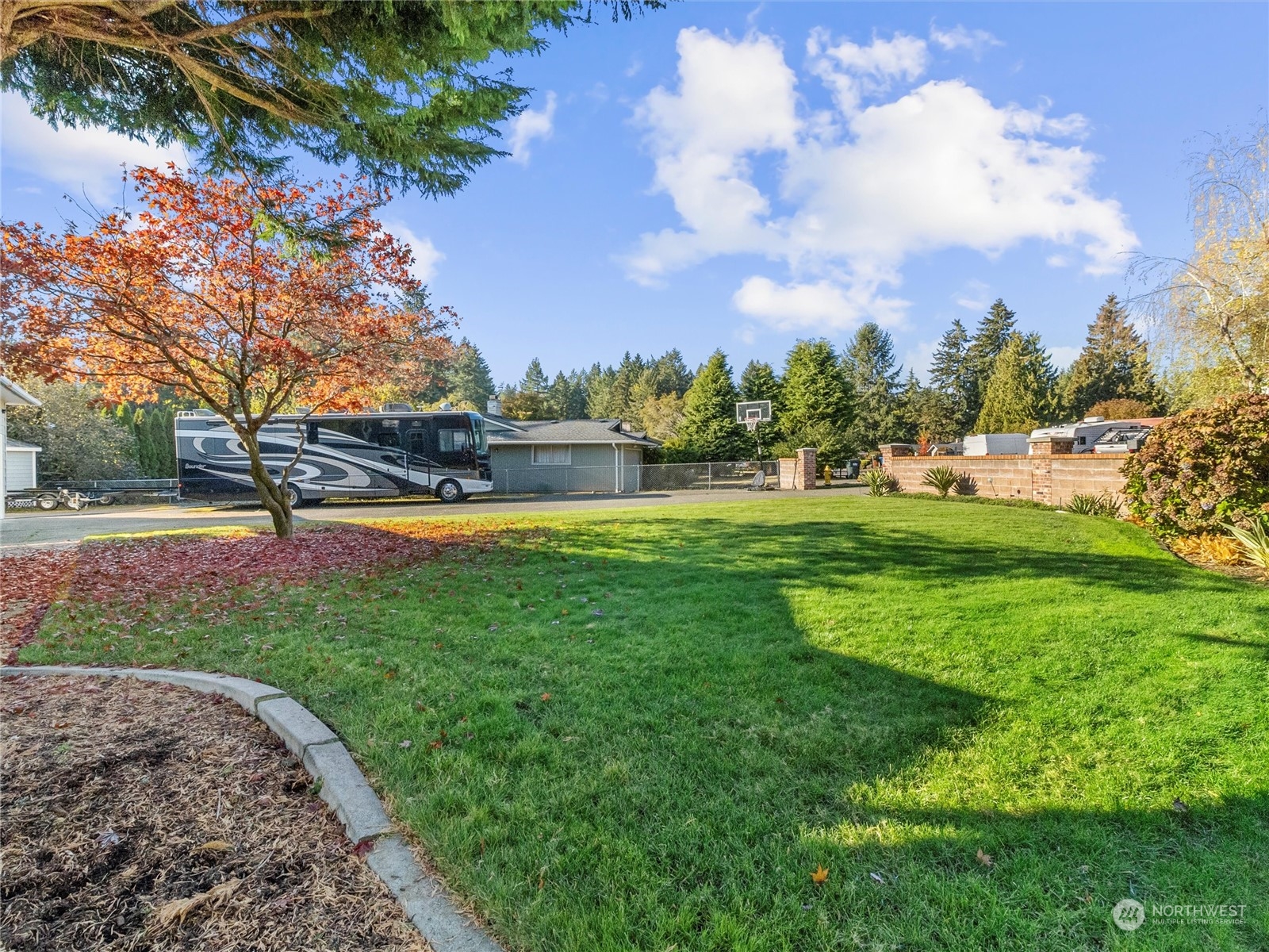 1304 153rd Street South Spanaway, WA 98387 - Photo 33 of 39 a view of a park with large trees