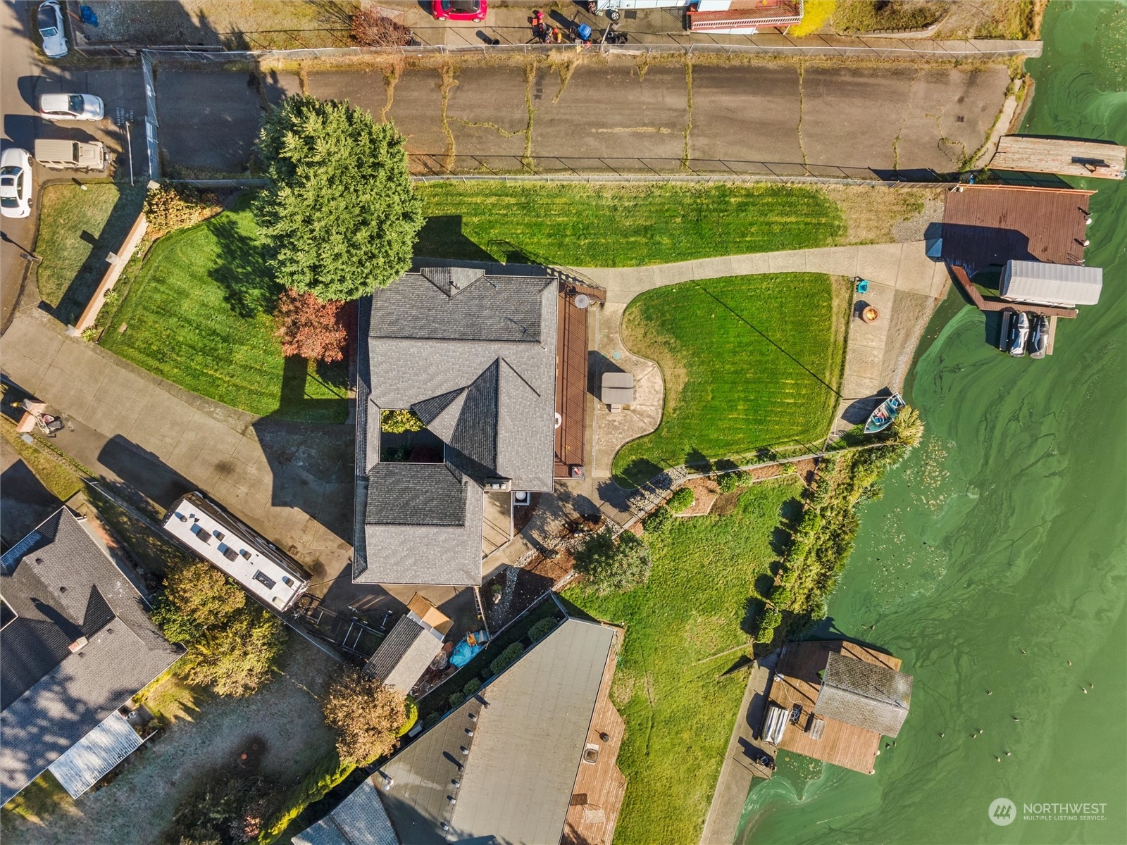 1304 153rd Street South Spanaway, WA 98387 - Photo 34 of 39 an aerial view of a house with a yard basket ball court and outdoor seating