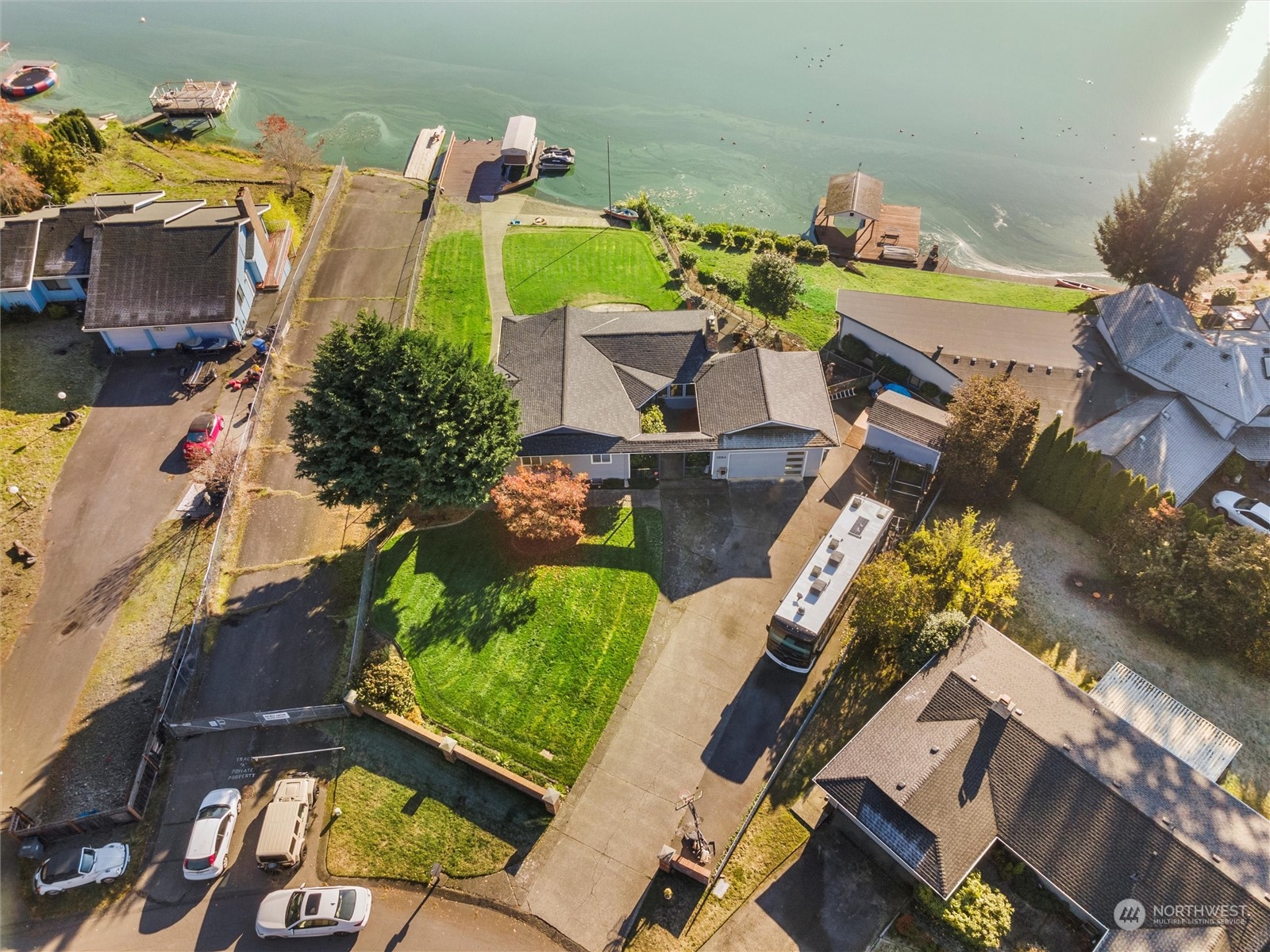 1304 153rd Street South Spanaway, WA 98387 - Photo 35 of 39 an aerial view of a house with a swimming pool patio and outdoor seating