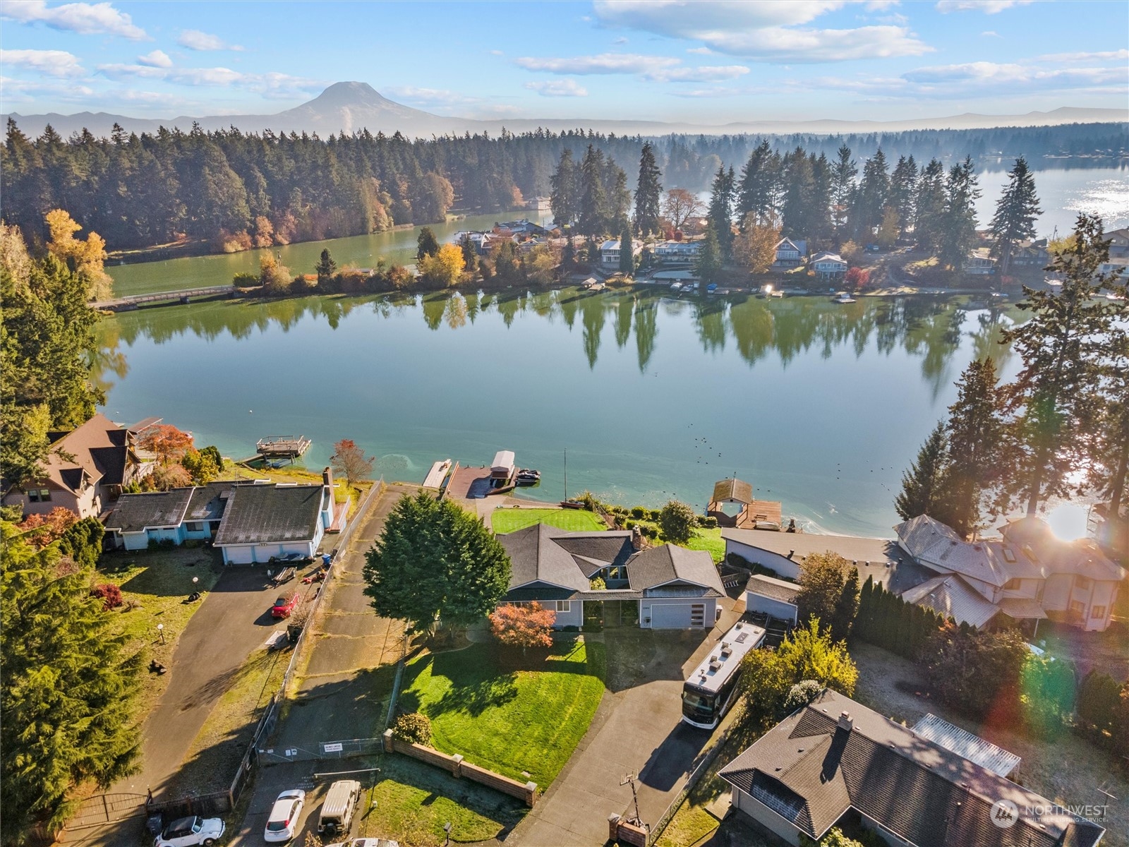 1304 153rd Street South Spanaway, WA 98387 - Photo 39 of 39 an aerial view of a house with a lake view