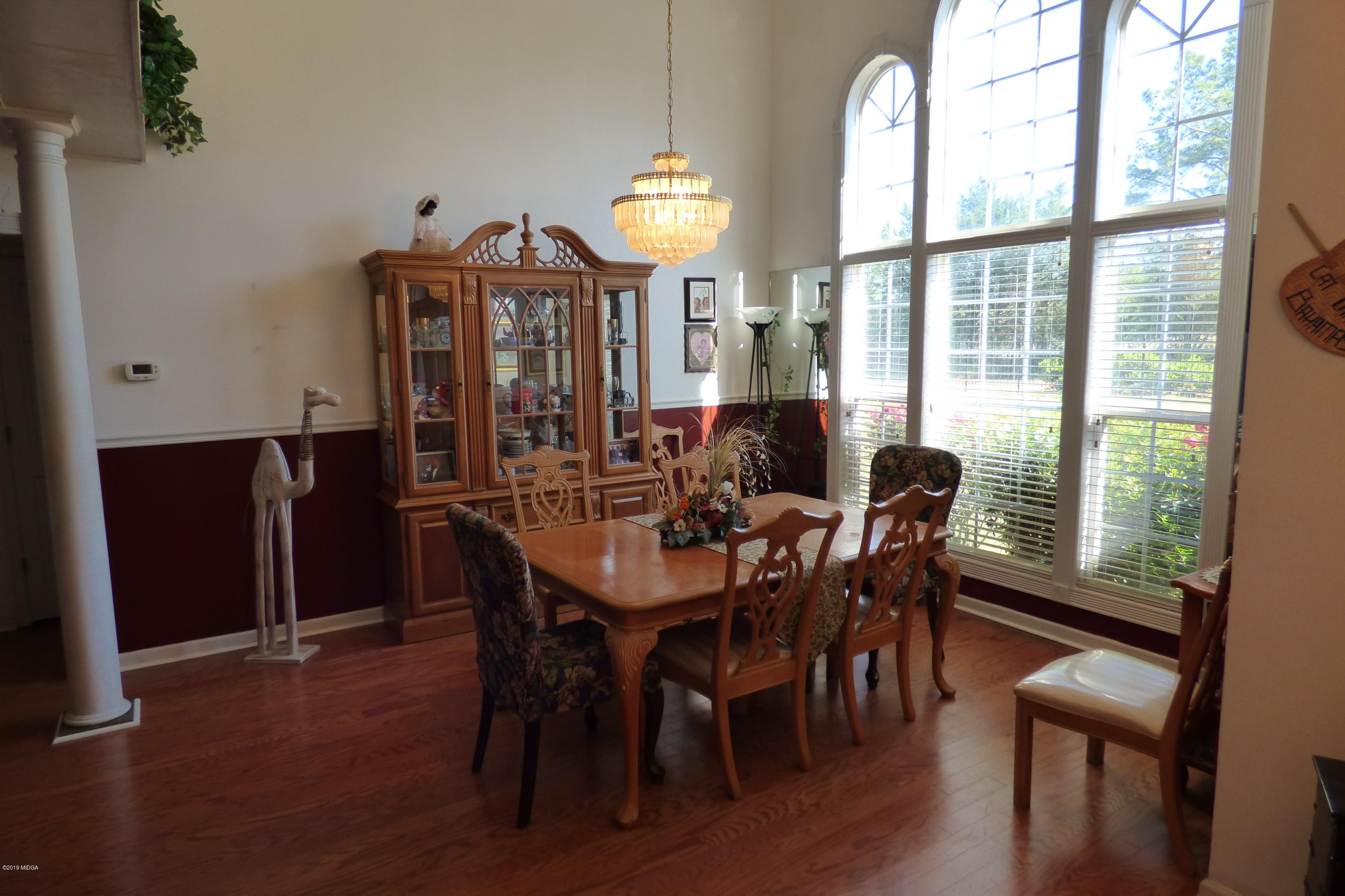 323 Rustin Road Reynolds, GA 31076 - Photo 10 of 25 a view of a dining room with furniture window and outside view