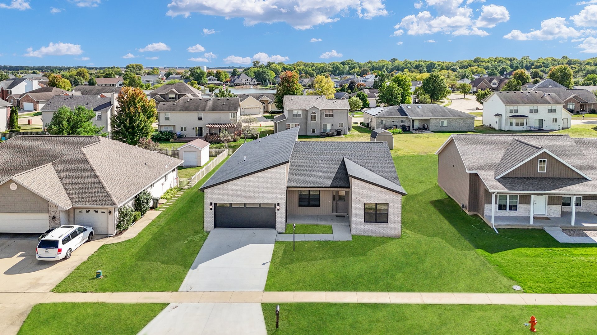 a aerial view of a house with a garden
