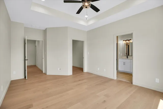 a bathroom with a double vanity sink and mirror