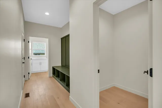 a bathroom with a shower and a sink