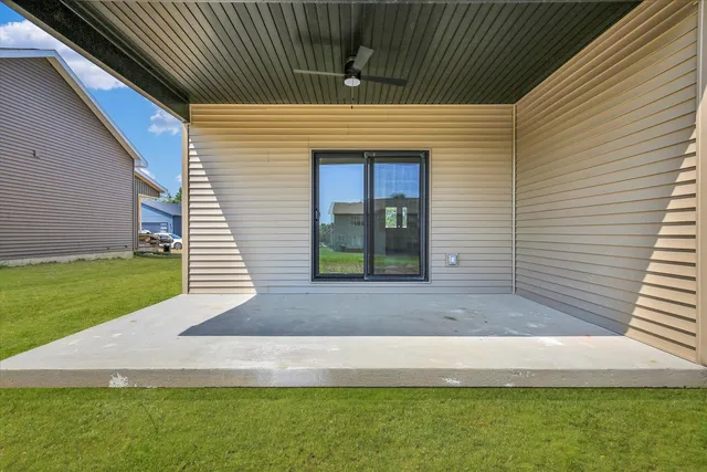 a view of a backyard of the house