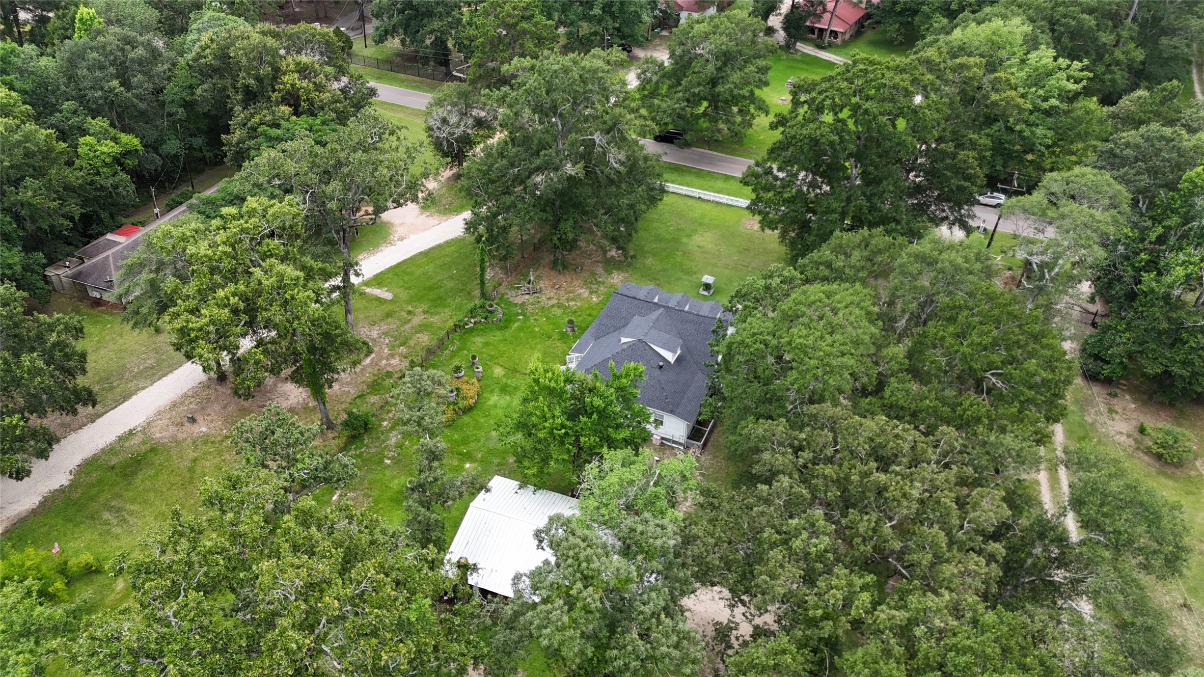 2118 Rolling Hills Road Conroe, TX 77303 - Photo 37 of 39 Bird's-eye view showcases the property's unique setting and outdoor space.