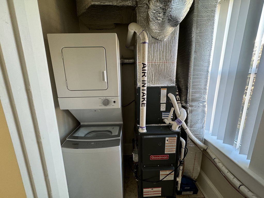 18 Short Street, Unit 3 Brookline, MA 02446 - Photo 14 of 14 a utility room with dryer and washer