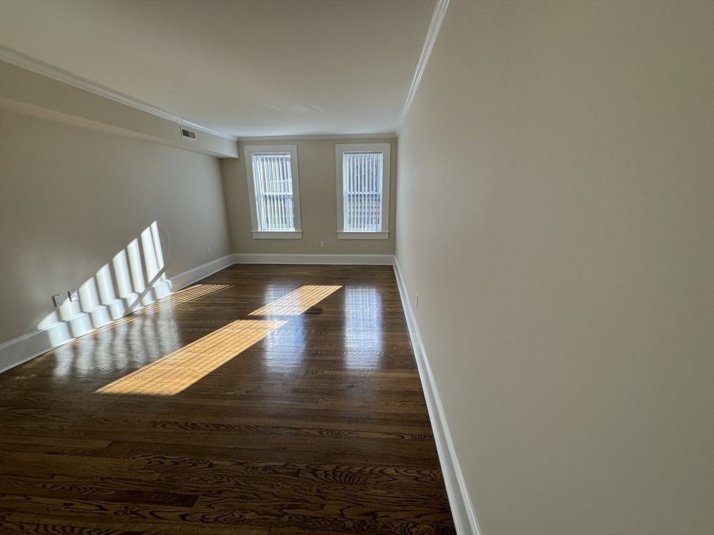 18 Short Street, Unit 3 Brookline, MA 02446 - Photo 2 of 14 a view of entryway with wooden floor