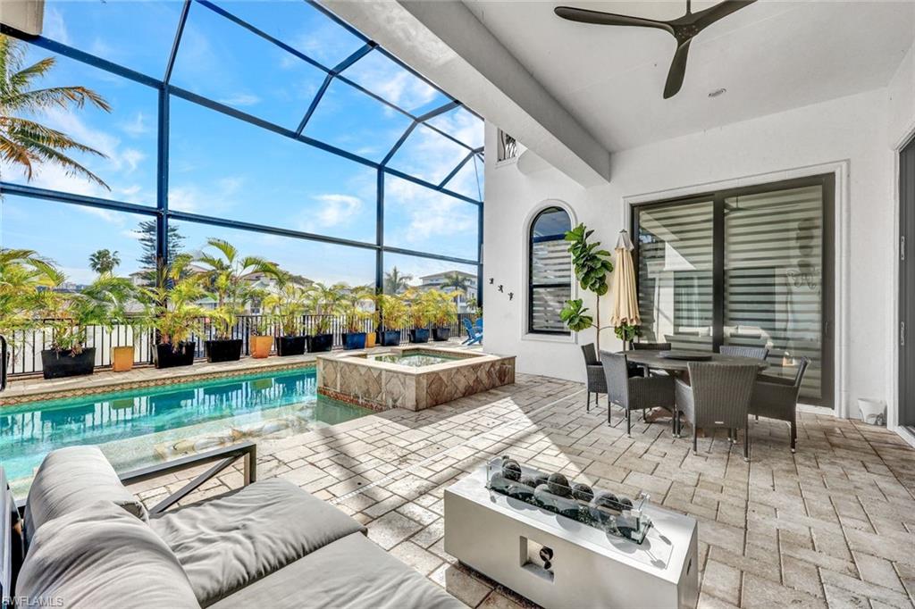 494 Seagull Avenue Naples, FL 34108 - Photo 21 of 32 a living room with furniture