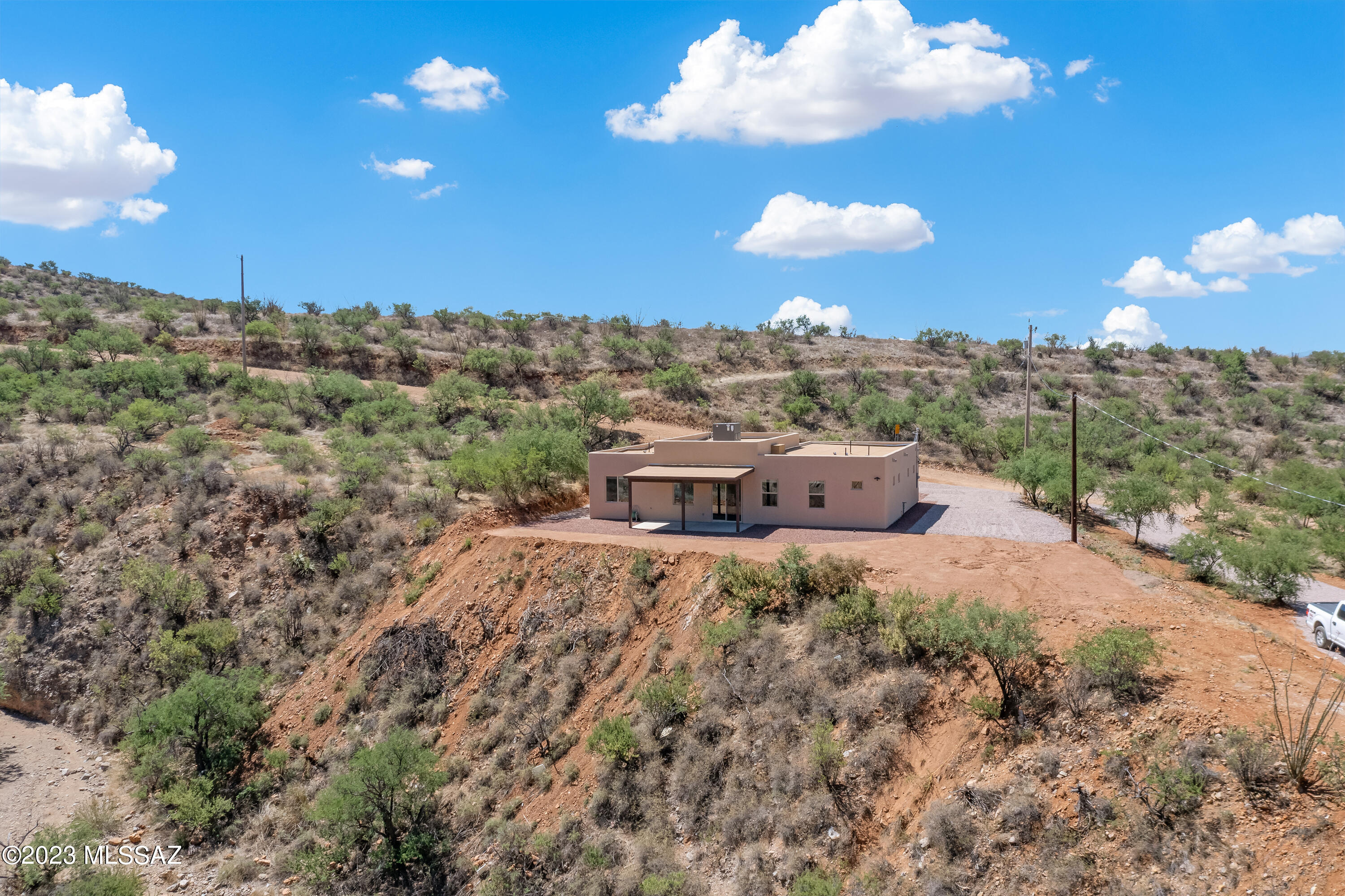 294 Circulo Cerro Rio Rico, AZ 85648 - Photo 35 of 38 a view of a house with a yard and chandelier