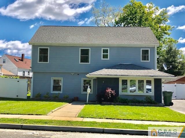 7 Gurley Road Edison, NJ 08817 - Photo 1 of 25 a front view of a house with a yard