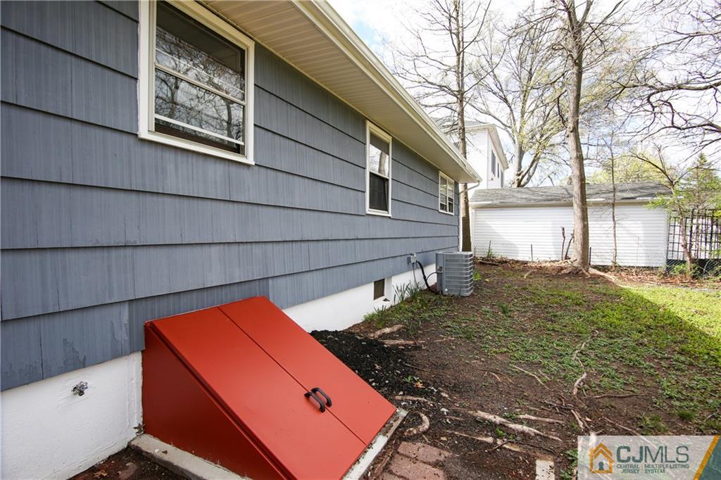 102 Magnolia Road Iselin, NJ 08830 - Photo 18 of 36 a backyard of a house