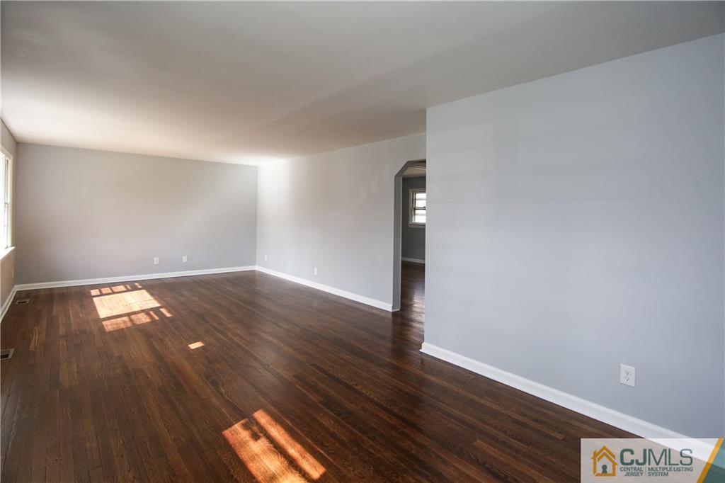 102 Magnolia Road Iselin, NJ 08830 - Photo 20 of 36 a view of empty room with wooden floor