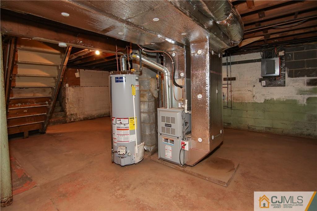 102 Magnolia Road Iselin, NJ 08830 - Photo 36 of 36 a view of an empty room with a staircase