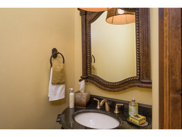 3027 Sherman Road Pebble Beach, CA 93953 - Photo 19 of 25 a bathroom with a sink and a mirror
