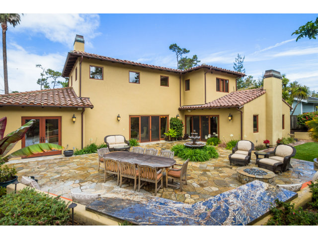 3027 Sherman Road Pebble Beach, CA 93953 - Photo 20 of 25 a backyard of a house with yard fire pit and outdoor seating