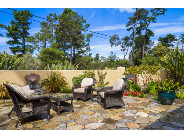 3027 Sherman Road Pebble Beach, CA 93953 - Photo 24 of 25 a view of a chairs and table in a backyard