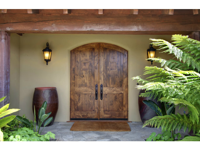 3027 Sherman Road Pebble Beach, CA 93953 - Photo 3 of 25 a front view of a house with garden
