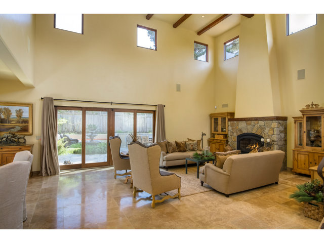 3027 Sherman Road Pebble Beach, CA 93953 - Photo 6 of 25 a living room with furniture and a fireplace
