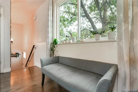 a view of livingroom with furniture and stairs